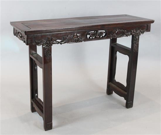 A late 19th / early 20th century Chinese hardwood altar table, W.4ft 2in. D.1ft 4.5in. H.2ft 11in.